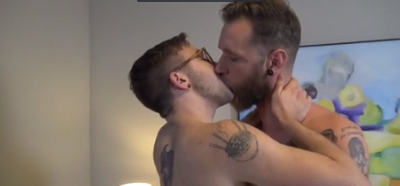 Ari drops to his knees, hungry to swallow Ryan’s massive cock